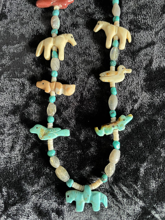 Traditional classic multi colored carved animal necklace