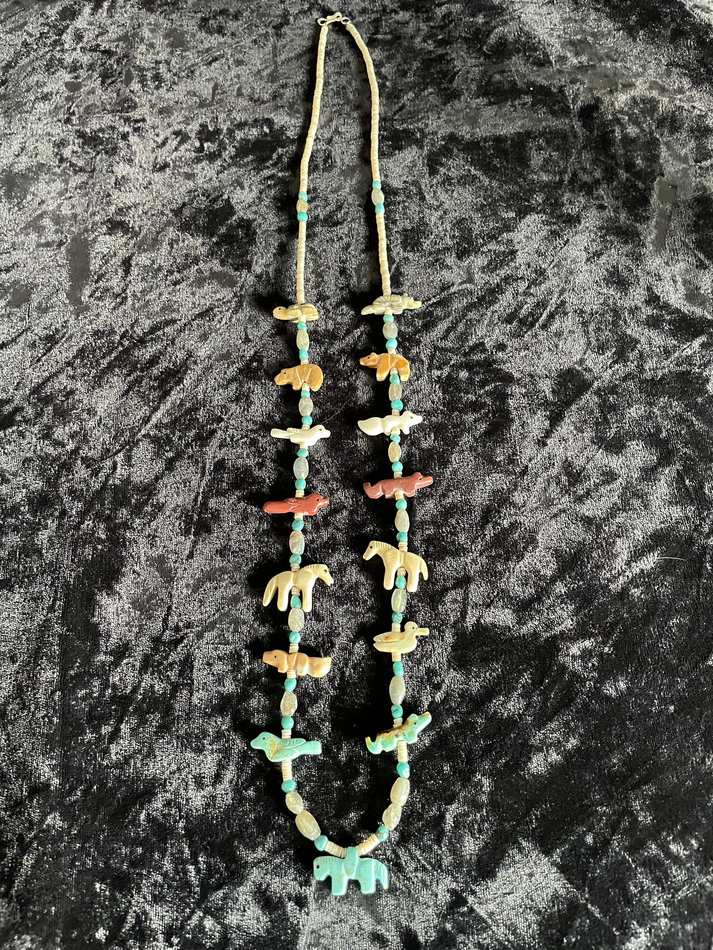 Traditional classic multi colored carved animal necklace