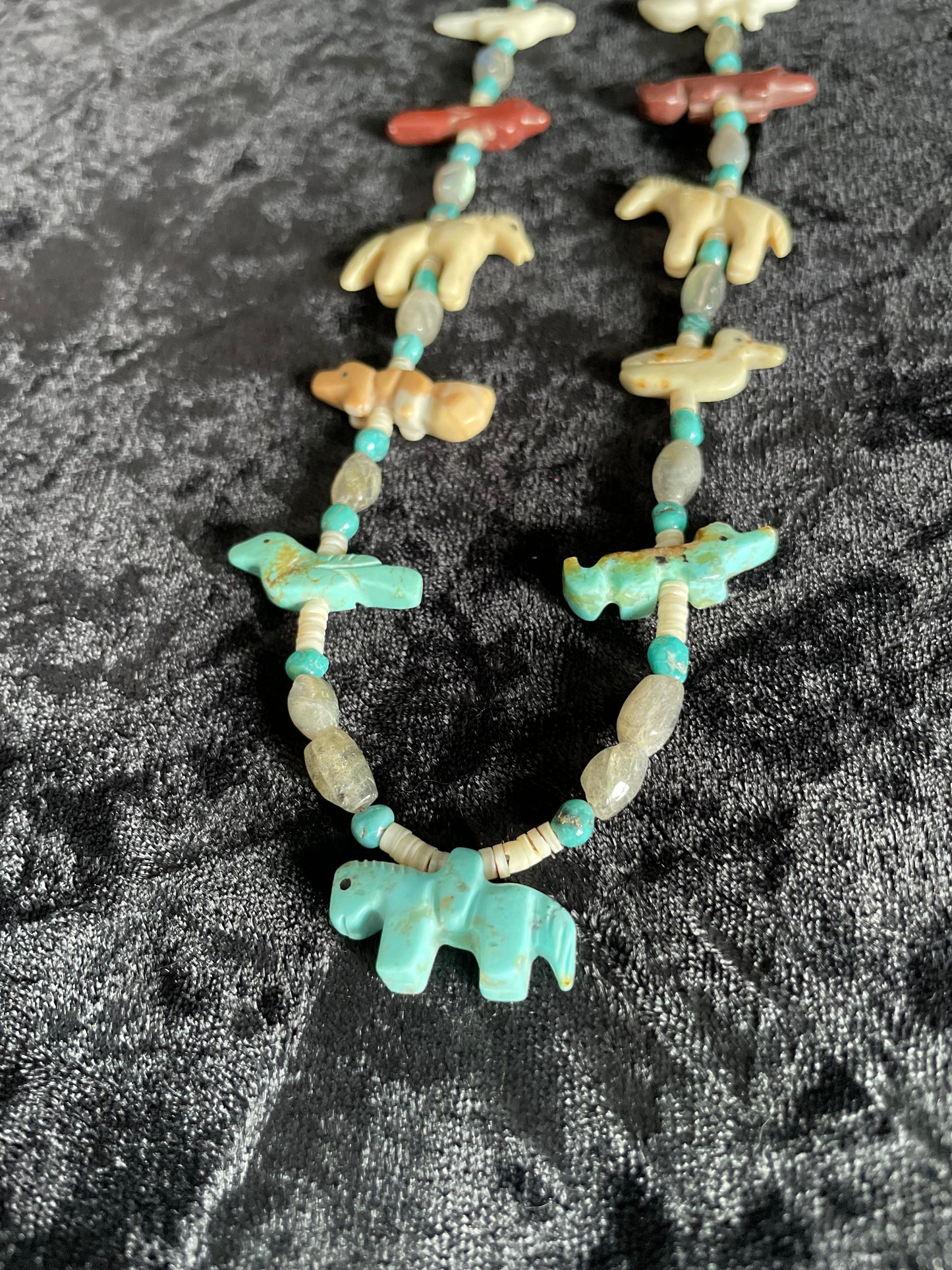 Traditional classic multi colored carved animal necklace