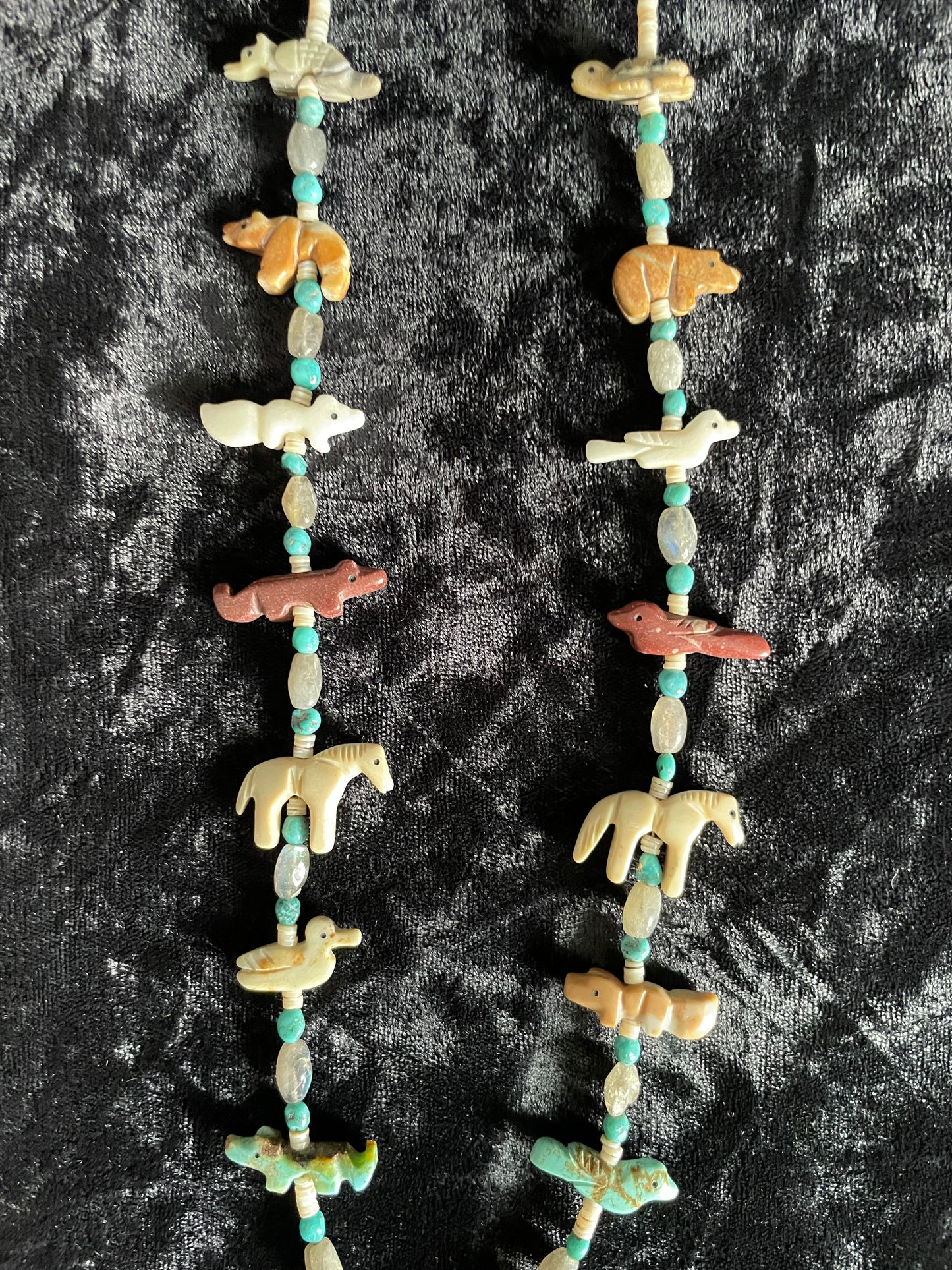 Traditional classic multi colored carved animal necklace