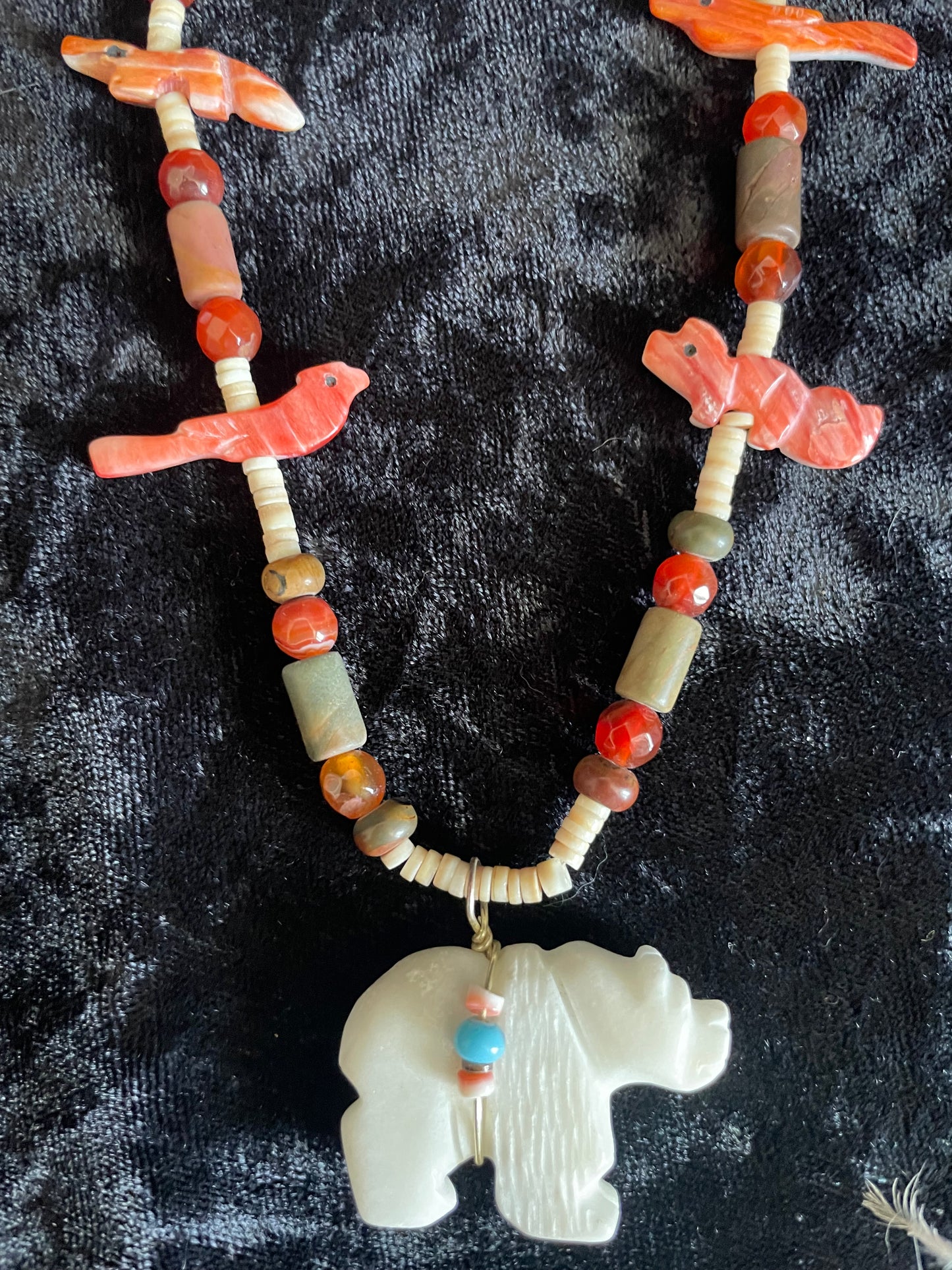 Hand Carved Orange Spiny Shell, Picasso, and White Marble Bear Necklace